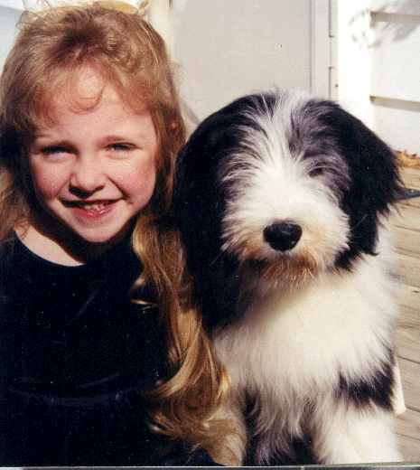 Dog and child smiling